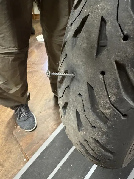 The screw backed out of the tire in the garage